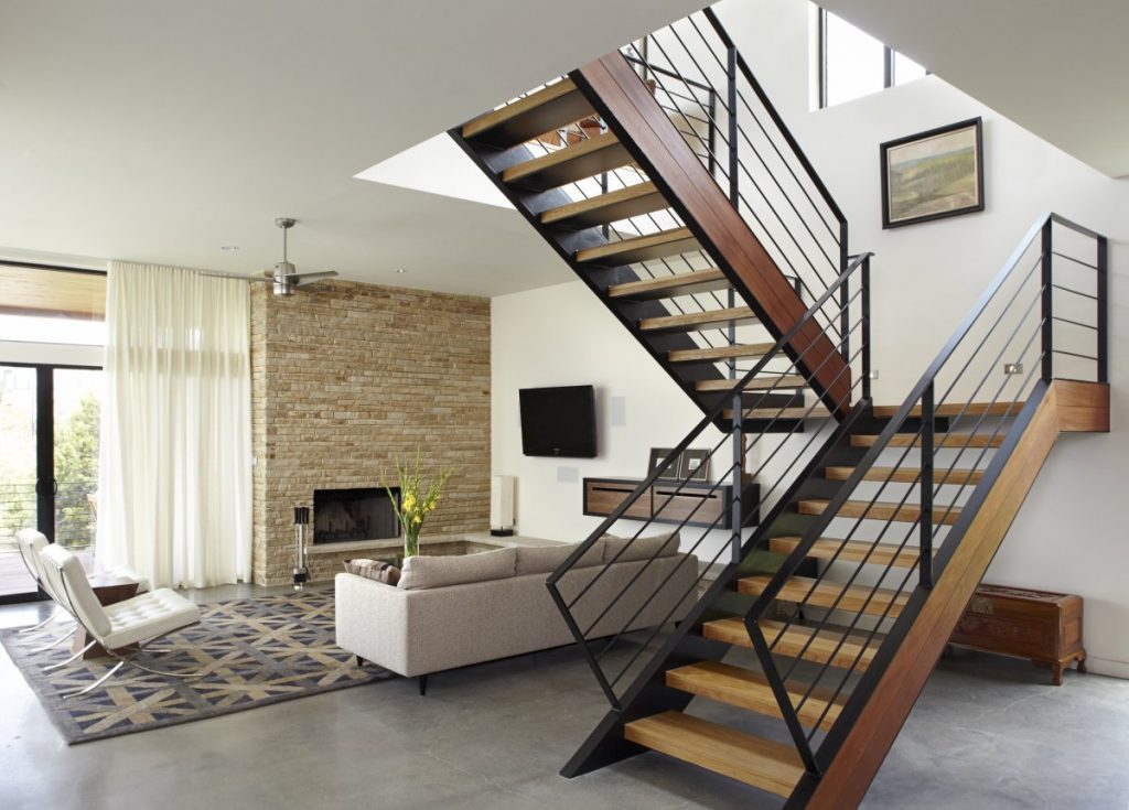 stair-design-ideas-interior-staircase-design-in-main-hall-for-duplex-house-with-sofa-fan-tv-rugs-storage